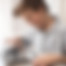 a-boy-seated-at-a-table-using-a-digital-tablet-ha-2023-11-27-05-17-19-utc_edited_edited.jp